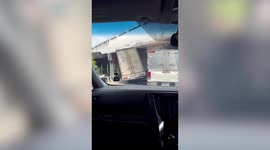 Dopey truck driver gets stuck under low bridge in Thailand
