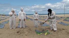 Activists protest on Copacabana beach as Brazil reaches 400,000 COVID-19 deaths