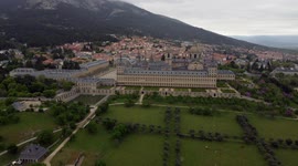 Drone view of beautiful El Escorial monastery in a cloudy day