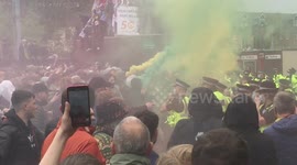 Watch moment Man Utd fans hurl projectiles at police outside Old Trafford during Glazer protest