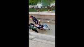 Chicago stabbing victim gives thumbs up as he is wheeled way from scene by medics