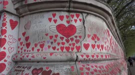 'NHS workers are 4 life - not just 4 COVID' message on The National COVID Memorial Wall in London