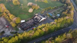 Dramatic drone footage show charred remains of historic golf club destroyed in suspected arson attack