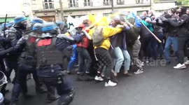 Water cannon and tear gas in Paris on International Workers' day rally