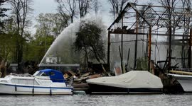 Crews dampen down at scene of 'accidental' blaze in Hampton, London