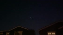 US residents film as 60 more Starlink satellites soar across night sky