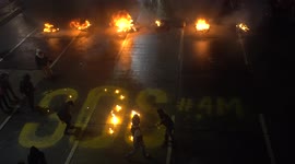Fires lit and projectiles thrown as protests over tax reform continue in Bogota