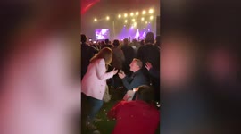 Emotional moment music lover proposes to girlfriend at UK government's pilot music festival