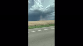 US: Dust Devil Swirls On A Field In Nebraska