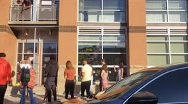 A taco piñata for cinco de mayo from a balcony welcomes all