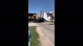 Unbelievable footage shows train crashing into 18-wheeler at Texas railroad crossing