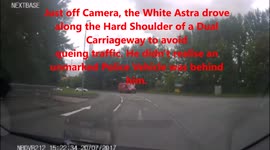 Driver queue-jumping along hard shoulder stopped by police