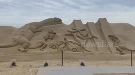 Impressive dinosaur sand sculptures take over South Korean beach during Jurassic exhibition