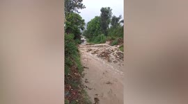 Heavy rain blocks village roads in Uttarakhand, India