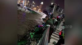 Policeman heroically dives into river to save drowning woman in China