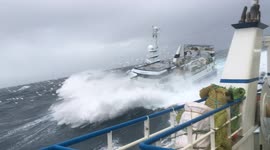 Ship tossed around like a toy in rough seas off the coast of Scotland