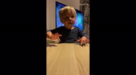 'Kid's Candy Challenge - Mom Tests Toddler's Patience with a Handful of Chocolates '