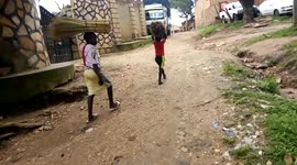 Kids work during hard times in Kampala, Uganda