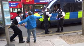 Police stop and search in progress on car passengers in Chelsea - London