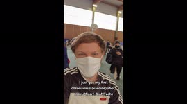 Travel YouTuber documents getting first shot of COVID vaccine