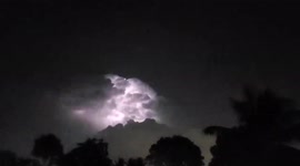 Storm cloud pulsating with lightning puts on a show over Florida