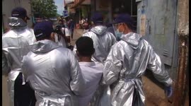 Sri Lankan police carry face-mask violators off to lengthy quarantine