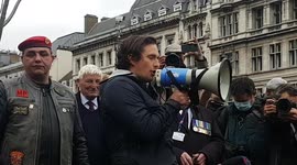 MP Johnny Mercer speaks in a march supporting veterans in London on VE day