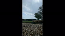 Bicycle crash featuring a little boy trying to do a stunt jump.