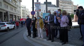 General Secretary of the PCP cheers union protesters during EU summit in Porto, Portugal