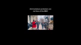Anti-Lockdown protests outside the BBC, chanting and putting stickers on the windows