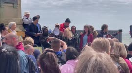 Anti-vaccination song being sung at anti-lockdown protest in Brighton