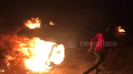 Palestinians ignite tyres after worshippers clash with Israeli police at mosque