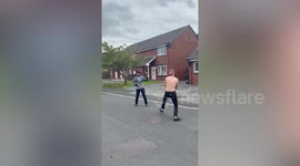 Horrific footage shows two men armed with machetes attack each other in Morecambe, UK