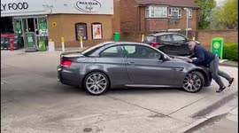 Alleged thieves make off with BMW from London petrol station as owner fills up