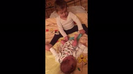 sister 3 years old changing the baby brother .twin babys.twins born in 2020