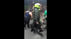 Officers slam protesters to ground as police make forceful arrests in Colombia