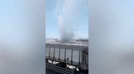 Dust devil tornado whips through quarry in the Philippines