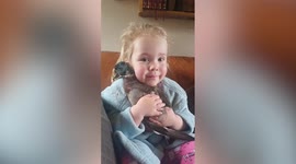 Adorable footage of a young girl cuddling her pet duck will absolutely melt your heart