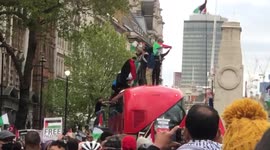Watch moment demonstrators wave Palestinian flag on top of double decker London bus during protest attended by Jeremy Corbyn