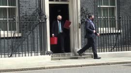 UK Prime Minister Boris Johnson leaves 10 Downing Street ahead of state opening of the parliament