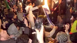 Pro-Palestinian protesters attempt to gain entry into Chelsea Football Stadium, burn Israel flag outside