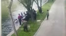 Passersby rescue three drowning children after their vehicle crashed into river in China