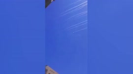 Rockets streak across sky as they are fired towards Israel