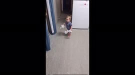 Guilty baby runs away after being caught red-handed ripping up toilet paper