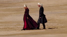 Actors wrapped in raincoats on set of 'Game of Thrones' prequel in Cornwall, UK