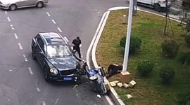 Bentley worth over £300,000 smashed after tricycle drives wrong direction on road in China