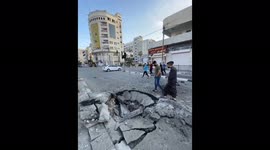 Buildings and roads in Gaza severely damaged by rockets fired from Israel