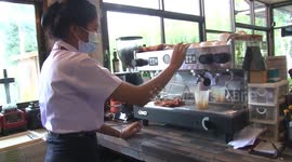 Robot serves drinks at coffee shop in northern Thailand