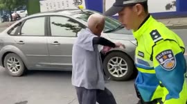Policeman in China sparks outrage after pepper-spraying 80-year-old man