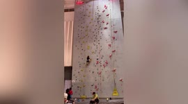 Talented young girl scales 12-metre-tall wall in just 10 seconds